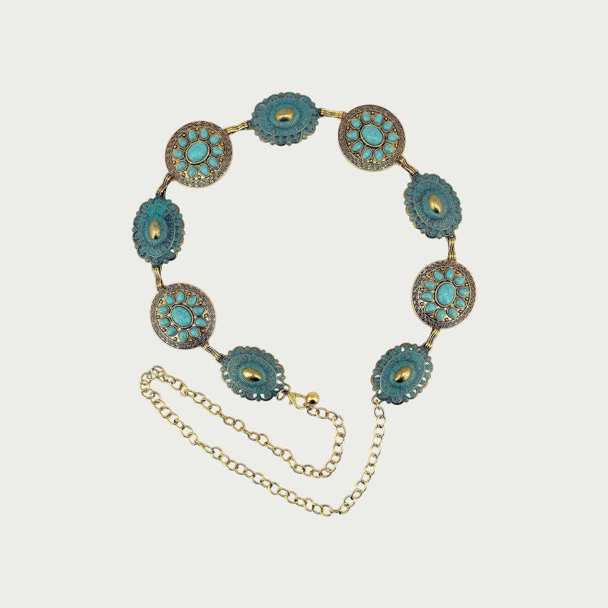 Ceinture chaîne Ceintura disposée en cercle, médaillons dorés patinés à cabochons turquoise et chaînette de réglage