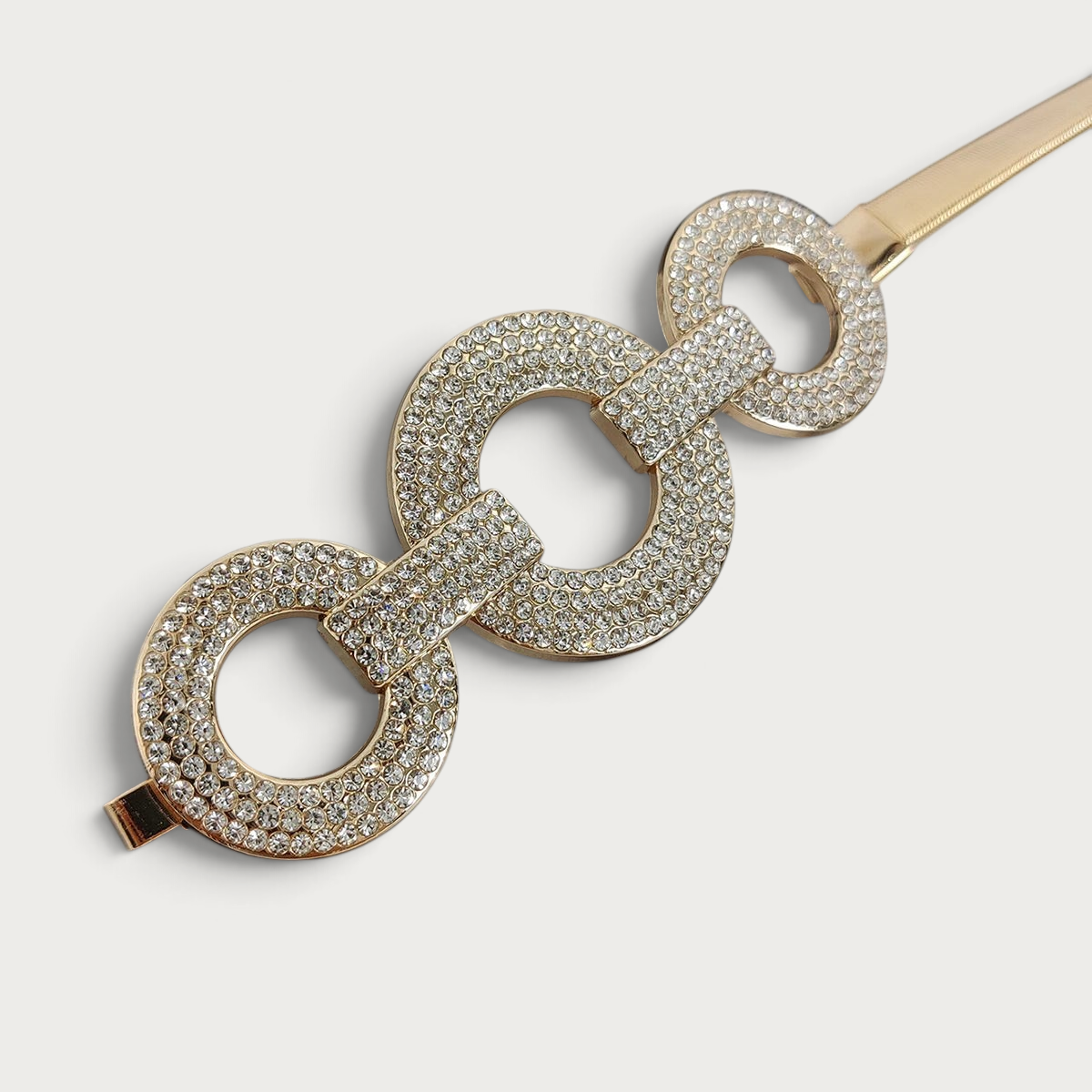 Ceinture bijoux élastique Ceintura Cefalù dorée avec trois anneaux ornés de strass scintillants