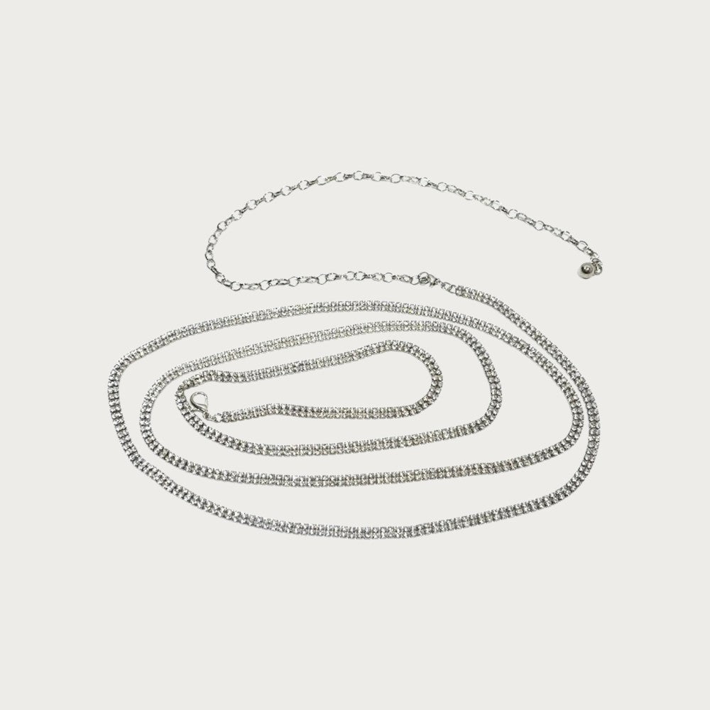 Ceinture bijoux Ceintura pour femme en métal argenté ornée de strass scintillants, style chaîne fine et élégante.