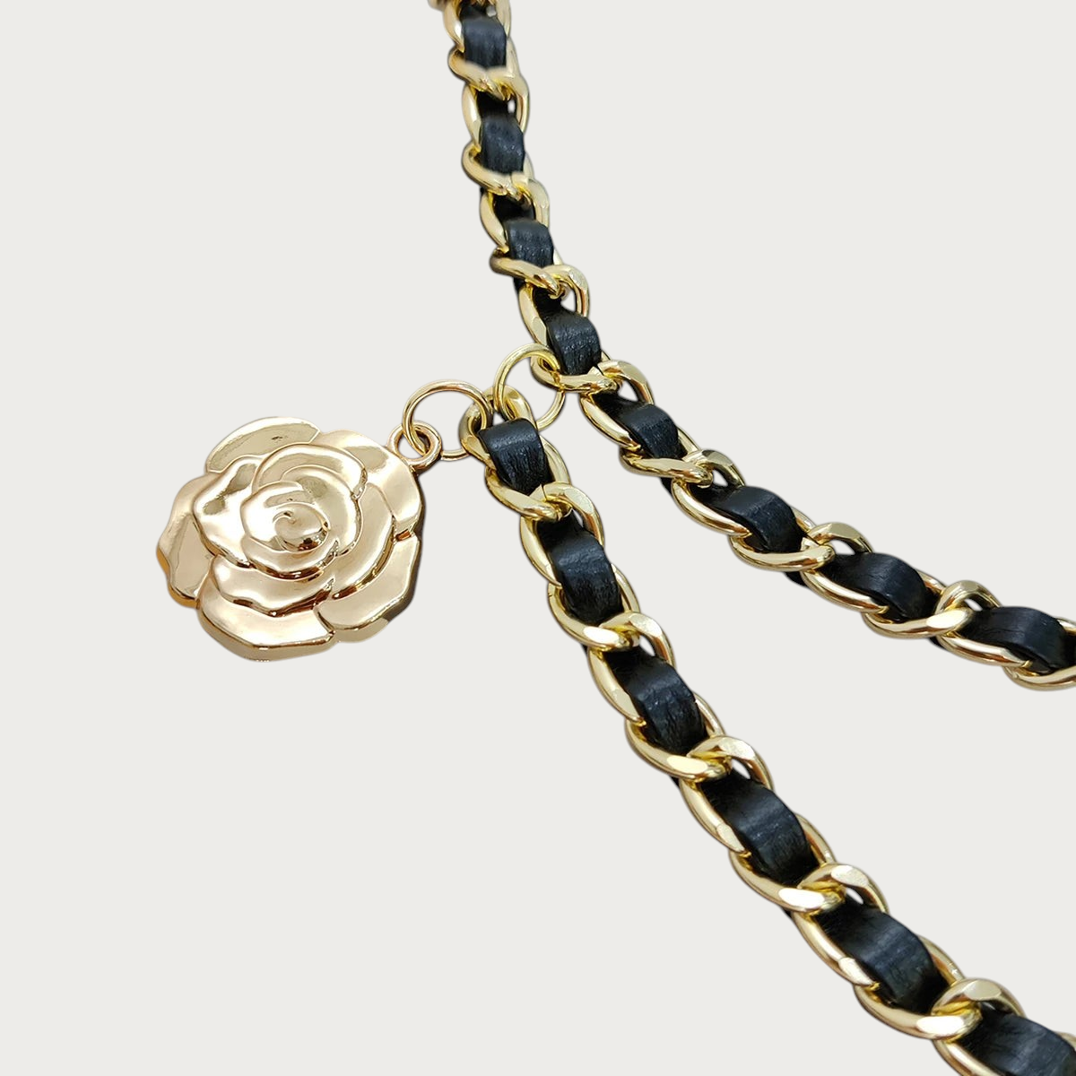 Ceintura ceinture chainette dorée et similicuir noir avec pendentif fleur pour femme Image