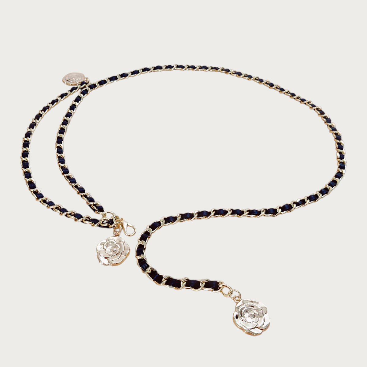 Ceinture chainette Ceintura dorée et noire avec détails de fleurs pour femme, style élégant et ajustable