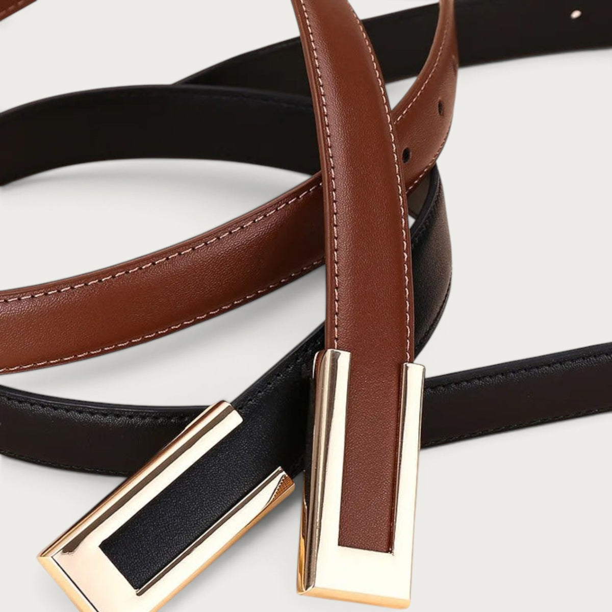 Ceinture Ceintura Portofino en cuir cognac et noir avec boucle géométrique rectangulaire dorée Image