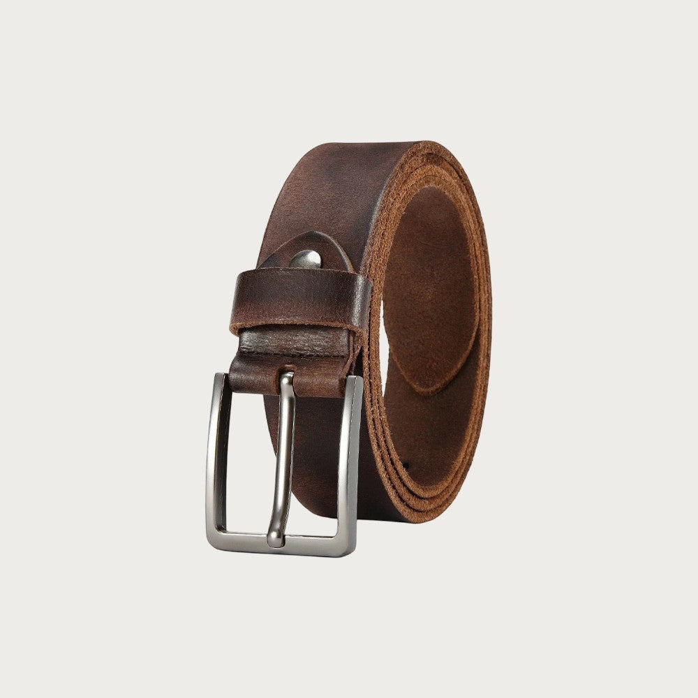 Ceinture Ceintura Grosseto en cuir de vachette marron brut enroulée, boucle ardillon argentée et passant riveté