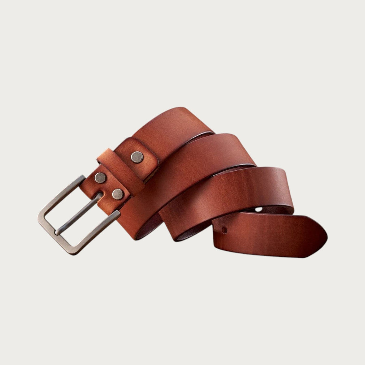 Ceinture Ceintura Potenza en cuir de vachette cognac enroulée souplement, grosse boucle ardillon en métal vieilli Image