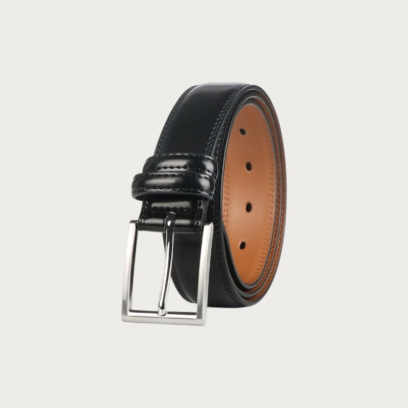 Ceinture Ceintura Brindisi en cuir noir enroulée serrée, boucle ardillon argentée et doublure camel