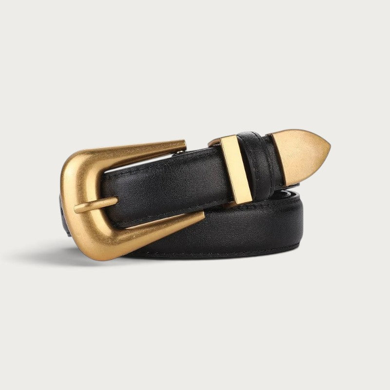 Ceinture Ceintura Sienne en cuir noir enroulée, boucle dorée sculptée et embout doré pointu en gros plan