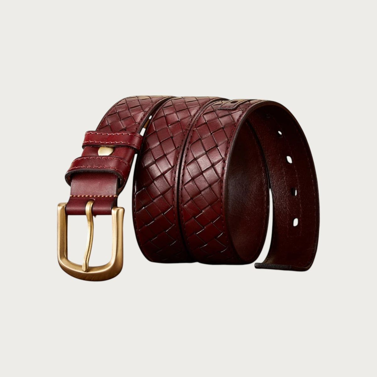 Ceinture large Ceintura Fortuna en cuir tressé brun rouge enroulée en trois tours, boucle en laiton vieilli
