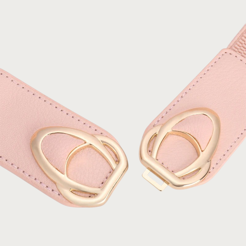 Gros plan sur le fermoir doré à anneaux entrelacés de la ceinture extensible Ceintura rose Image