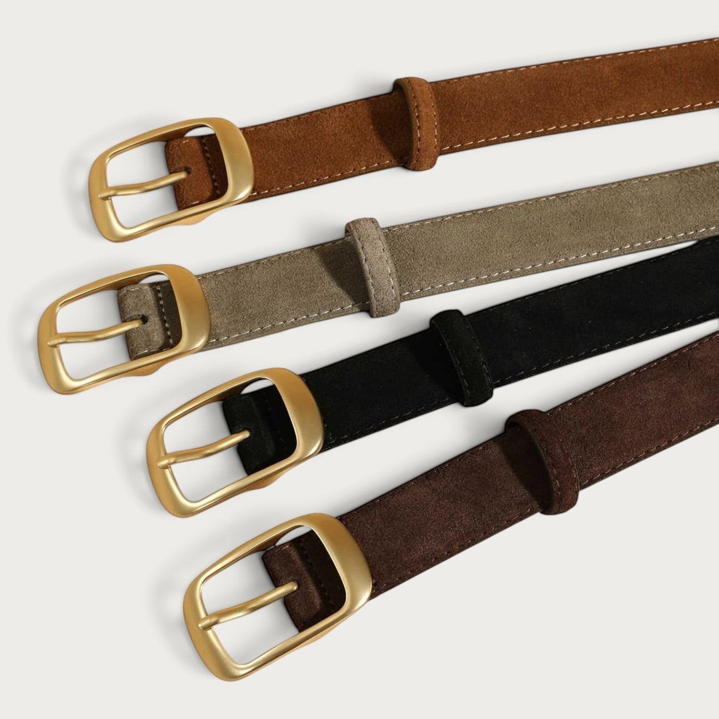 Ceintura ceinture femme en cuir retourné avec boucle argentée, disponible en plusieurs coloris unis. Image