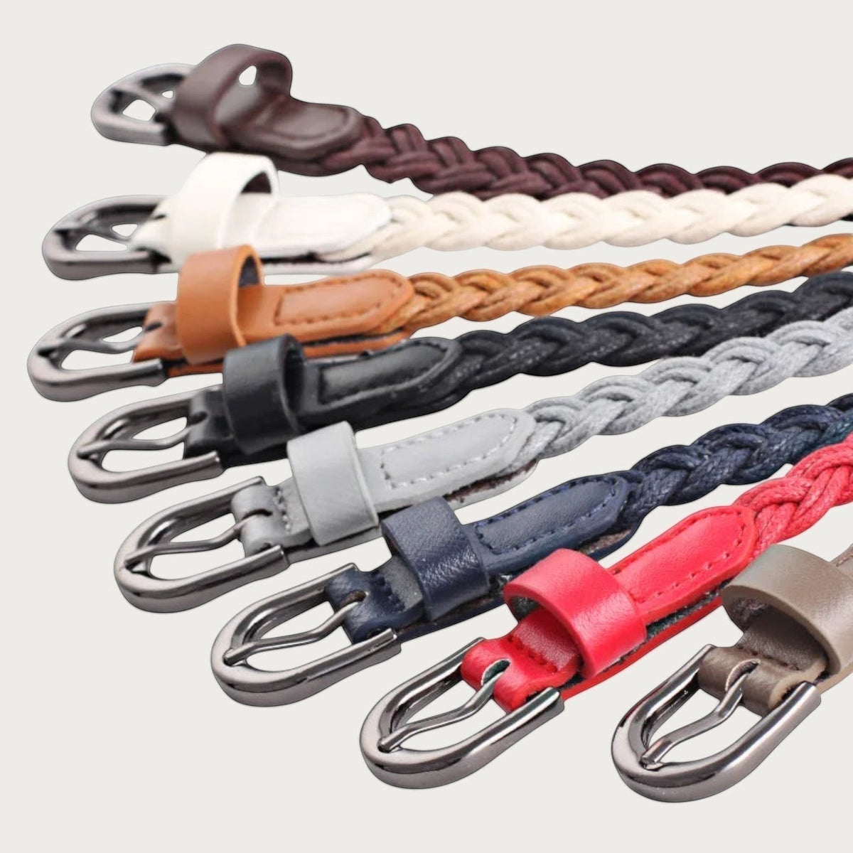Ceinture fine tressée Ceintura Luce en corde avec boucle argentée, disponible en sept coloris variés pour femme.