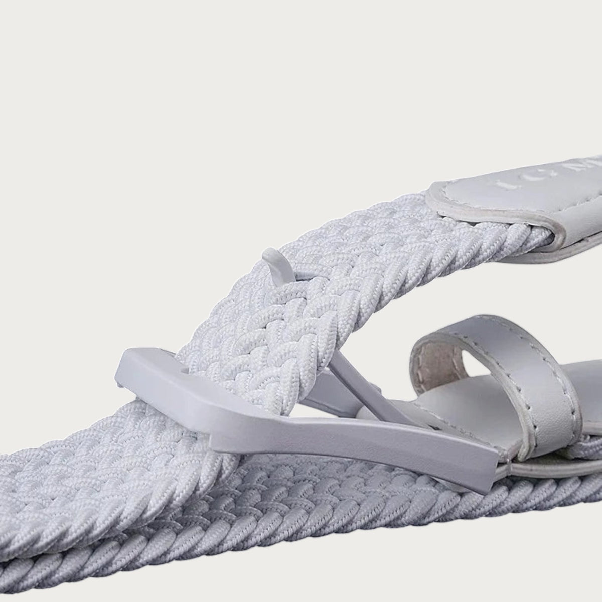 Ceintura ceinture de golf tressée blanche en toile élastique avec détails en PU et boucle assortie pour un style décontracté