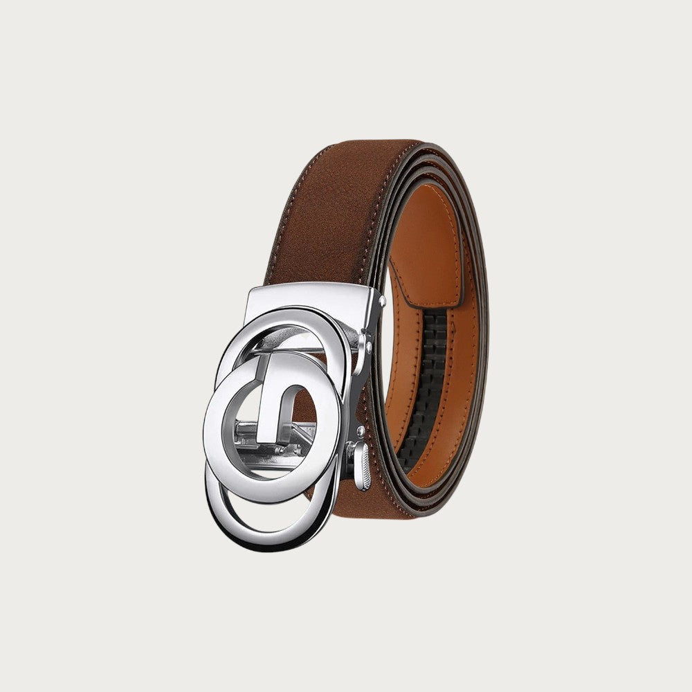 Ceinture Ceintura Trapani marron enroulée, gros plan sur la boucle ajourée argentée et la doublure caramel Image