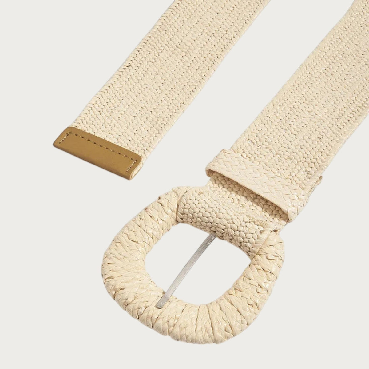 Ceinture large Ceintura en paille tressée beige avec une boucle ronde assortie et une finition artisanale élégante.