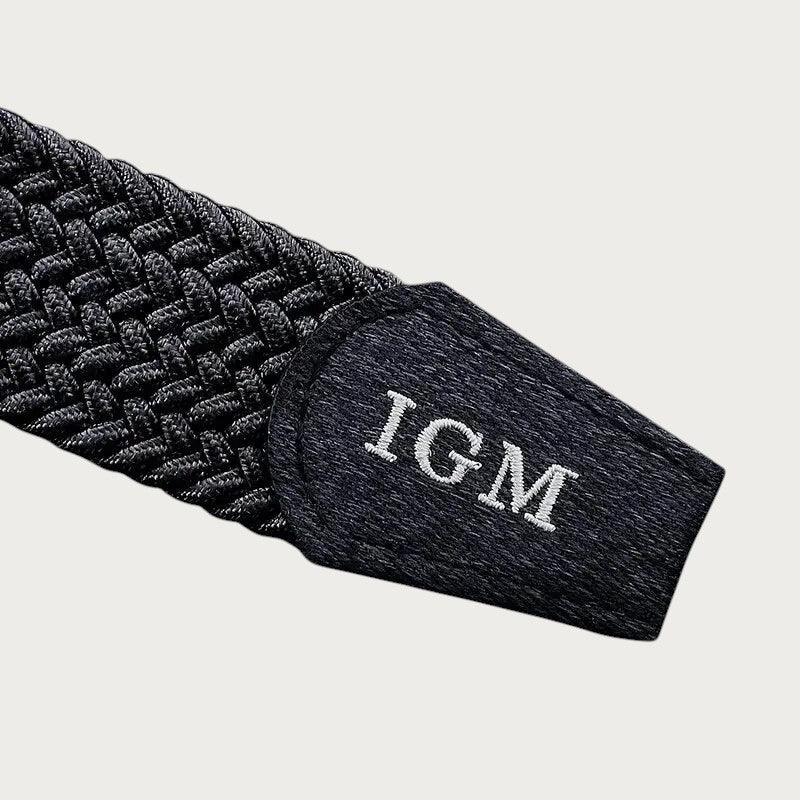 Ceinture tressée élastique noire pour homme de la marque Ceintura avec détail en toile et logo IGM
