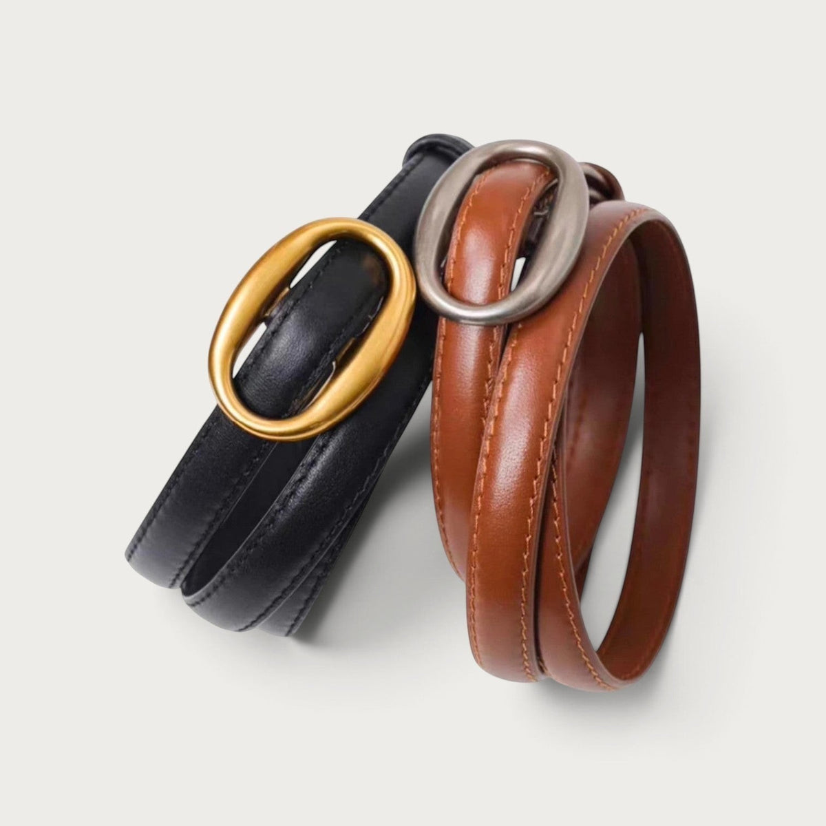 Ceintures en cuir Ceintura Ravello, modèles noir et marron avec boucles ovales en métal doré et argenté brossé